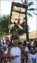  ?? WILLIAM ROLLER PHOTO ?? Pablo Carrillo (left) and daughter Breana at the 14th annual March Against Domestic Violence in El Centro, Wednesday.