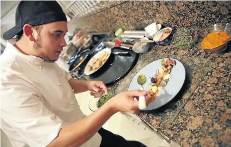  ?? Picture: Sebabatso Mosamo ?? Executive chef Joshua Levack prepares a THC-infused meal for a pre-tasting ahead of his upcoming cannabis cuisine dinner.