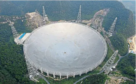  ??  ?? The world’s biggest radio telescope will be switched on today. At 500 metres wide it easily dwarfs the next biggest observator­y and is 10 times more sensitive