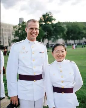  ?? U.S. Army ?? Robert Norwood (left) of Siloam Springs graduated from the U.S. Military Academy in West Point, N.Y., on Saturday. Norwood was also one of the students featured in a series posted on the U.S. Army website “USMA Class of 2020 Cadets: ‘With Vision We Lead’ in their own words.”