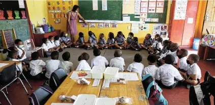  ?? Picture: Esa Alexander ?? It is untenable, says basic education minister Angie Motshekga, that ‘we continue to teach our children in foreign languages while imparting knowledge about foreign concepts’. Here, children begin their school careers at Perivale Primary School in Grassy Park, Cape Town, in January.