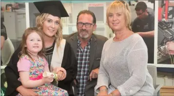  ??  ?? Cathy Byrne, from Bridgetown, who graduated, pictured with her daughter Lilly and parents David and Pauline Byrne.