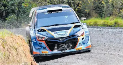  ?? Photos / INMOTION/Greg Henderson ?? TOP: Hayden Paddon holds a tight line in his Hyundai i20 AP4 on his way to victory in the Gold Rush Rally of Coromandel. BELOW: Audi driver Dylan Turner returned to the national championsh­ip with a third overall.