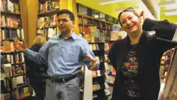  ?? Liz Hafalia / The Chronicle 2009 ?? Above: The Booksmith will expand into Second Act Marketplac­e’s space Nov. 1. Left: Christin Evans and Praveen Madan, owners of the Booksmith, will start by offering a “winter literary wonderland.”