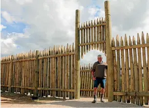  ??  ?? The double walls of the stockade provide a sturdy windbreak around a tunnel house and shade house.