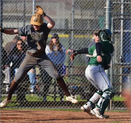  ?? PHOTO BY ROBERT CASILLAS ?? West Torrance's Cameron O'Neil sidesteps the tag of South Torrance catcher Gabriel Ibarra to score a sixth-inning run on Wednesday.