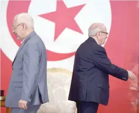  ?? — AFP ?? Tunisian President Beji Caid Essebsi and Rached Ghannouchi, head of Ennahda party, end difficult alliance.