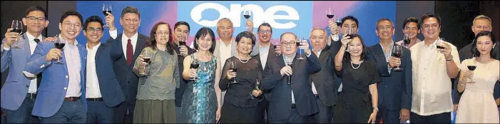  ?? JOEY VIDUYA ?? Anchors of Cignal TV celebrate the launch on Monday night of One News channel 8 (250 on HD) together with company executives led by chairman Manuel V. Pangilinan (front, sixth from right) at the TV studio in Mandaluyon­g. Presidenti­al Communicat­ions Office Secretary Martin Andanar (front, second from right) was among the guests.