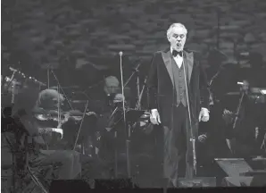  ?? ?? Bocelli, a Grammy- and Emmy-nominated Italian tenor, performs alongside the Columbus Symphony, led by guest conductor Steven Mercurio. A crowd turned out in force to hear Bocelli and his special guests perform.