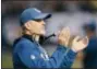  ?? AJ MAST — THE ASSOCIATED PRESS ?? Indianapol­is Colts head coach Chuck Pagano applauds during the first half of an NFL football game against the Houston Texans, Sunday in Indianapol­is.