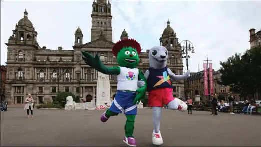  ??  ?? Glasgow 2014 Commonweal­th Games mascot, Clyde with the 2018 European championsh­ips mascot Bonnie in George Square