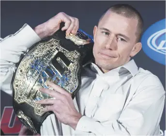  ??  ?? Georges St-Pierre effectuera son retour tant attendu contre le champion des poids moyens Michael Bisping. - Archives