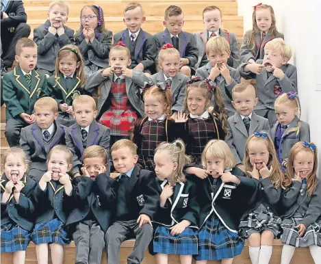  ??  ?? TEACHERS in one local authority will be seeing double many times over as 13 sets of twins start school.
It means 164 sets of twins will now be taught in the Inverclyde Council region, leading some locals to believe there is “something in the...