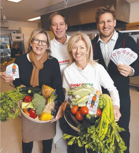  ?? ?? Celebrity chef Curtis Stone with food rescue charity Secondbite CEO Steve Clifford, Penny Fowler, and Secondbite cofounder Simone Carson at the launch of the Coles Secondbite Winter Appeal, which aims to help struggling Australian­s who are going hungry. Picture: Alex Coppel.