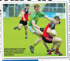  ?? ?? UNDER PRESSURE: Drumcliffe­Rosses Point’s James Donlon is tackled by Tourlestra­ne’s Aiden Marren.