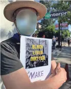  ?? COURTESY OF JENNIFER JOLLY ?? Jennifer Jolly’s husband attends a peaceful protest in Oakland, Calif., last week. Image Scrubber was used to blur out his face.