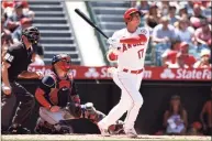  ?? Michael Owens / Getty Images ?? The Angels’ Shohei Ohtani hits a solo home run against the Red Sox during the fifth inning on Wednesday in Anaheim, Calif.