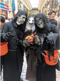  ??  ?? Trio of terror at a Halloween party in Japan. Leave it to the Japanese to come up with zany costumes.