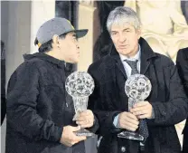  ?? PHOTOS: REUTERS ?? Lost legends . . . Paolo Rossi (right) with Diego Maradona at an Italian football hall of fame awards ceremony in Florence in 2017.