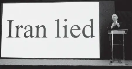  ??  ?? Israeli Prime Minister Benjamin Netanyahu makes a presentati­on on Iranian nuclear weapons developmen­t in Tel Aviv on Monday.