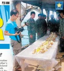  ?? JAIME LAUDE ?? Japanese and Filipino journalist­s who sought shelter aboard the BRP Sierra Madre join Marines in a boodle fight.