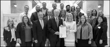  ?? Special to the MDR ?? Governor Hutchinson proclaims Economic Developmen­t Week in Arkansas. First row LR: Kaitlyn Rigdon, Shelby Fiegel, Danny Games, Governor Asa Hutchinson, Mallory Darby, Shelley Short, Courtney Dunn. Second row LR: Jack Pillow, Corey Parks, James Lee Silliman, Katherine Holmstrom, Nancy Lee Mcnew, Eddie Lee Herndon, Theda Mahoney. Third row LR: Jon Chadwell, Randy Zook, James Bell, Stephen Houserman, Olivia Womack, Ben Walters, Chung Tan. (Randall Lee)