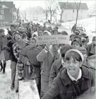  ?? MILWAUKEE SENTINEL ?? Students at Fulton Junior High School march on Jan. 17, 1968, in support of a boycott of the school's lunchroom, which at the time didn't have any African-American cooks.