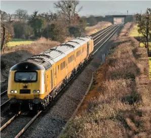  ?? JACK BOSKETT. ?? Network Rail New Measuremen­t Train 43062 John Armitt and 43014 The Railway Observer passes through Claydon (near Ashchurch) on January 23, bound for Derby. Chief Executive Andrew Haines has suggested NR has neglected key issues that have affected performanc­e.