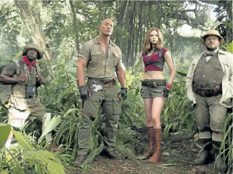  ?? FRANK MASI/SONY PICTURES VIA AP ?? From left: Kevin Hart, Dwayne Johnson, Karen Gillan and Jack Black in Jumanji: Welcome to the Jungle.