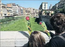  ?? PERE DURAN/ NORD MEDIA ?? El riu Onyar, testimoni ahir del dia de la rosa i el llibre