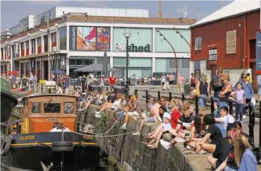  ??  ?? Left, crowds enjoying the sun at the Harboursid­e – people are being warned of the dangers of swimming in the harbour; right, Inspector Rob Cheeseman