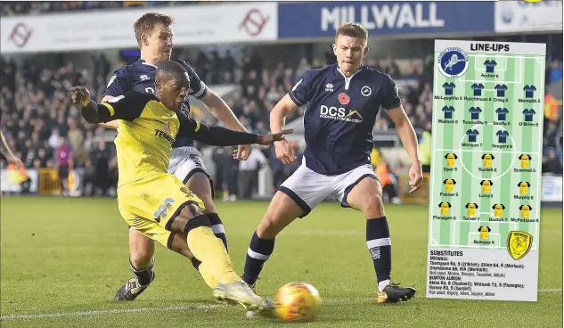  ?? PICTURES: Richard Holmes/Pro Sports Images ?? STRIKE IT LUCKY: Marvin Sordell scores Burton’s winner to seal their first away win of the season