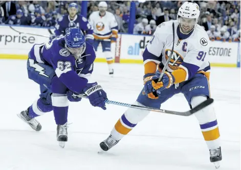  ?? CHRIS O’MEARA /ASSOCIATED PRESS ?? Tampa Bay Lightning defenceman Andrej Sustr defends New York Islanders’ John Tavares during the first period of Game 1 of the NHL hockey Stanley Cup Eastern Conference semifinals on Wednesday, in Tampa, Fla.