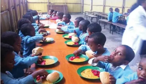  ??  ?? Beneficiar­ies of Federal Government’s Home Grown School Feeding Programme [TheSun]