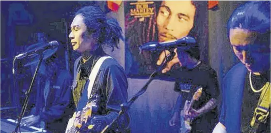  ?? (Photo: Universal Music China) ?? Chinese reggae band Long Shen Dao performs a tribute concert at an anniversar­y event held for Jamaican reggae icon Bob Marley in Beijing, on Saturday.