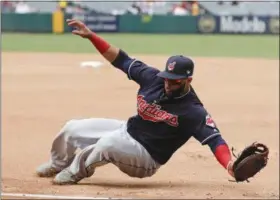  ?? THE ASSOCIATED PRESS FILE ?? Indians manager Terry Francona likes first baseman Carlos Santana’s attitude and defense. Santana will become a free agent after the World Series.