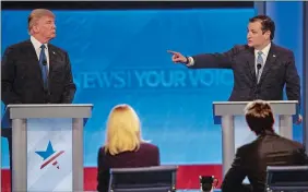  ?? DAVID GOLDMAN/AP PHOTO ?? Sen. Ted Cruz, R-Texas, points at Donald Trump during Saturday’s Republican presidenti­al primary debate at St. Anselm College in Manchester, N.H.