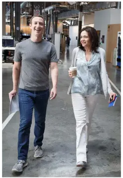  ??  ?? Sheryl with Facebook CEO Mark Zuckerberg.