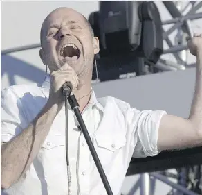  ?? PAUL CHIASSON/THE CANADIAN PRESS ?? The Tragically Hip’s upcoming tour starts in Victoria on July 22. Lead singer Gord Downie was diagnosed with terminal brain cancer, which was revealed by the band on May 24. The Hip’s tour was announced the next day.