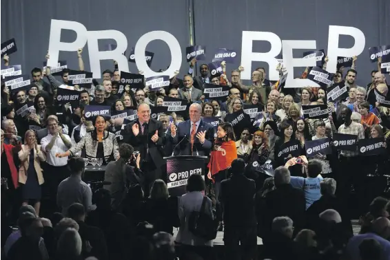  ?? CHAD HIPOLITO, THE CANADIAN PRESS ?? Premier John Horgan and B.C. Green Party Leader Andrew Weaver at an Oct. 23 rally in Victoria in support of proportion­al representa­tion.