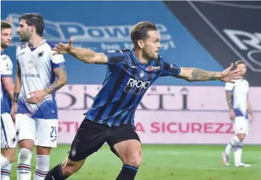  ?? Associated Press ?? ↑
Atalanta’s Rafael Toloi celebrates after scoring against Sampdoria during their Italian League match in Bergamo on Wednesday.