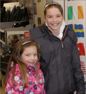  ??  ?? Ciara and Chloe Kehoe from Mayglass who visited the Tuskar Air Tragedy 50th commemorat­ion stand in Murphy’s SuperValu Rosslare Harbour.