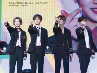  ??  ?? Popular Chinese boy band “Nine Percent” attending a fan event