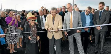  ?? STEPHEN BARKER/NZTA ?? King Tuheitia Potatau Te Wherowhero and Transport Minister Phil Twyford cut the ribbon on the Huntly section of the Waikato Expressway yesterday.