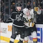  ?? Sean M. Haffey Getty Images ?? DREW DOUGHTY, left, once again made his case for being considered the best defenseman in the NHL.