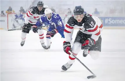  ?? MARK BLINCH/THE CANADIAN PRESS ?? Since TSN acquired the world junior broadcast rights in 1991, the tournament has gone from attracting “friends and family” to millions of viewers on TV.