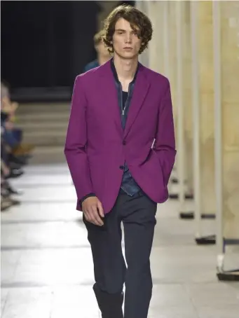  ??  ?? Hermes presented suit jackets in a grape shade for spring/summer 2017