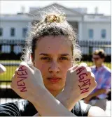  ?? EVAN VUCCI / AP ?? Seventeen-year-old Gwendolyn Frantz of Kensington, Md., stands in front of the White House during a student protest for gun control, Wednesday in Washington.