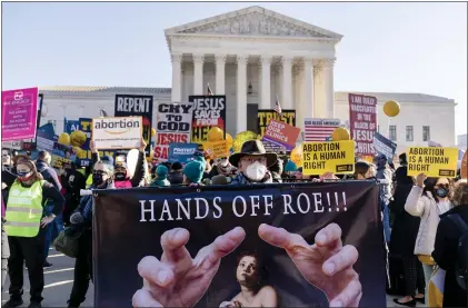  ?? ANDREW HARNIK - THE ASSOCIATED PRESS FILE ?? Abortion rights and pro-life advocates in front of the U.S. Supreme Court on Dec. 1, 2021. One year ago, the court rescinded a five-decade-old right to abortion.