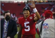  ?? NHAT V. MEYER — BAY AREA NEWS GROUP FILE ?? 49ers starting quarterbac­k Trey Lance (5) waves to the fans as he leaves the field after their 23-7 win over the Texans at Levi's Stadium in Santa Clara on Jan. 2.